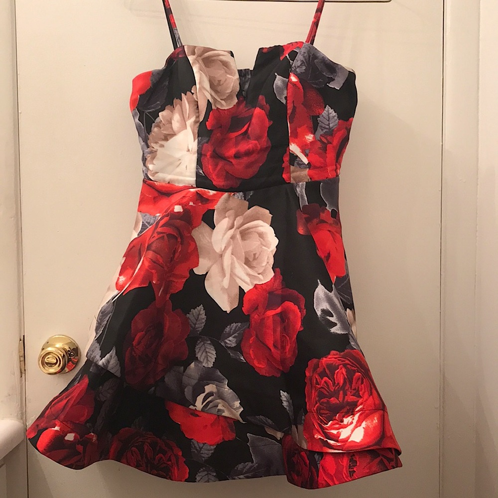 Black dress with red and white flowers. 7 Juniors